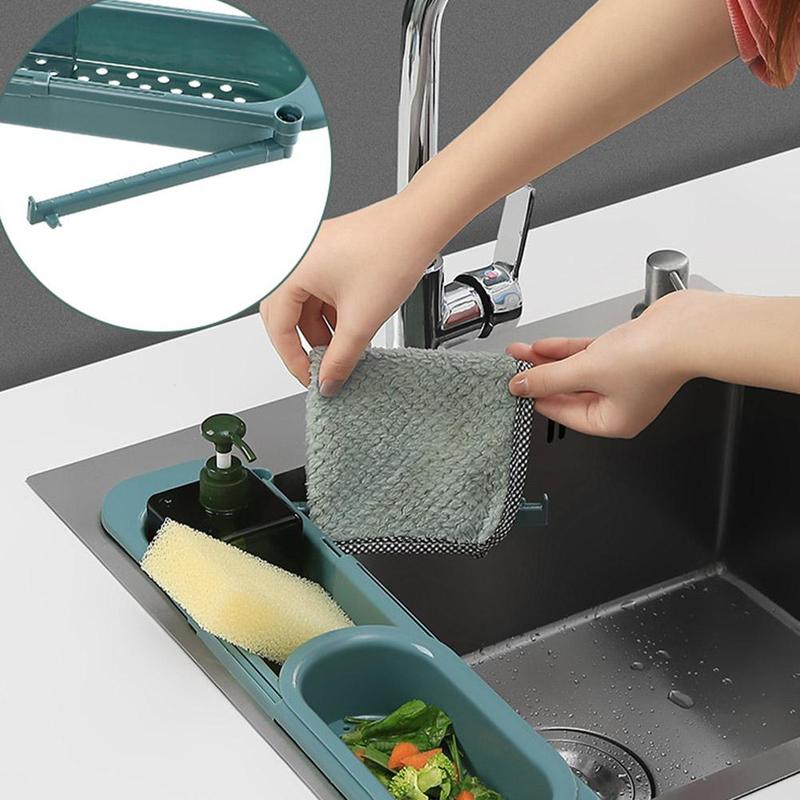 Sink rack with black sponge and gray brush
