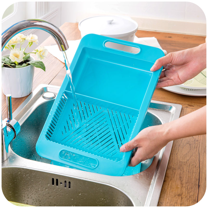 Multifunctional chopping board with drain basket