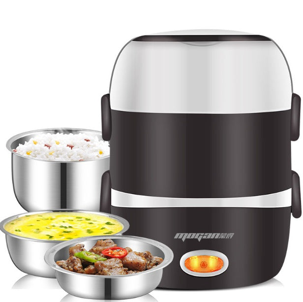 White and silver compact rice cooker viewed from an elevated front angle