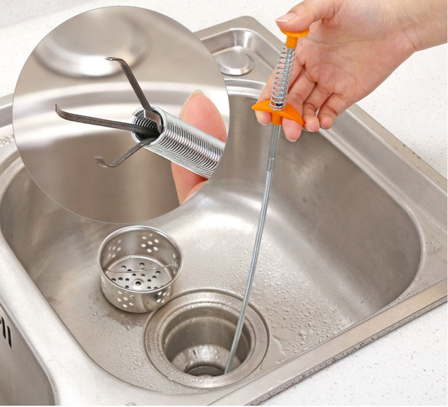 Drain cleaning spring tool in sink