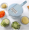 8-in-1 vegetable slicer and grater set with collection container