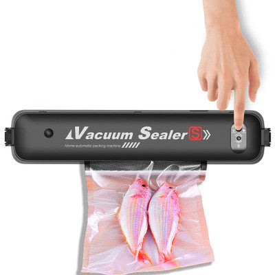 Black vacuum sealing machine with its sealing compartment open
