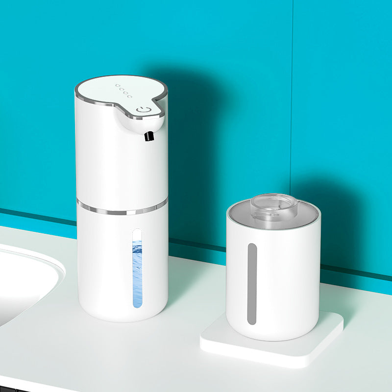 Automatic sensor soap dispenser dispensing soap beneath a hand