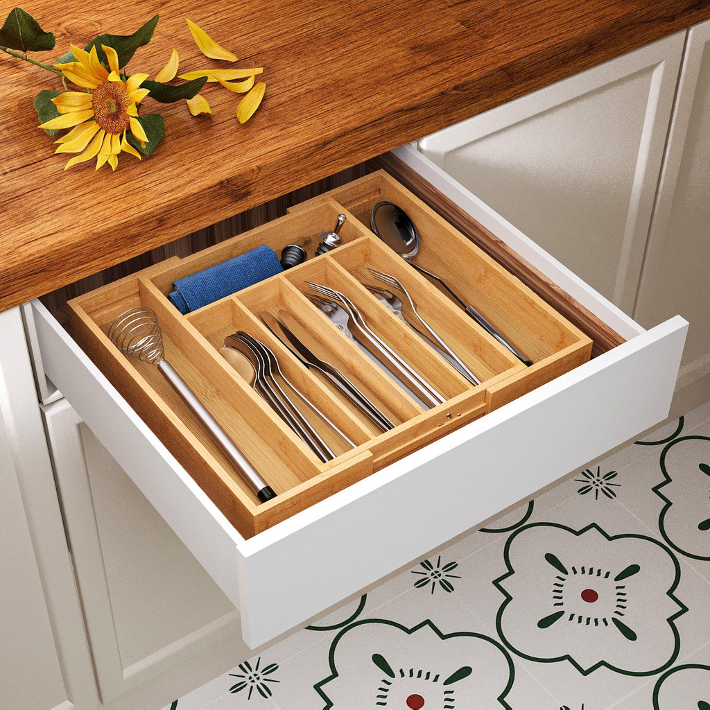 Bamboo drawer organizer with 5+2 compartments viewed from the side with contents