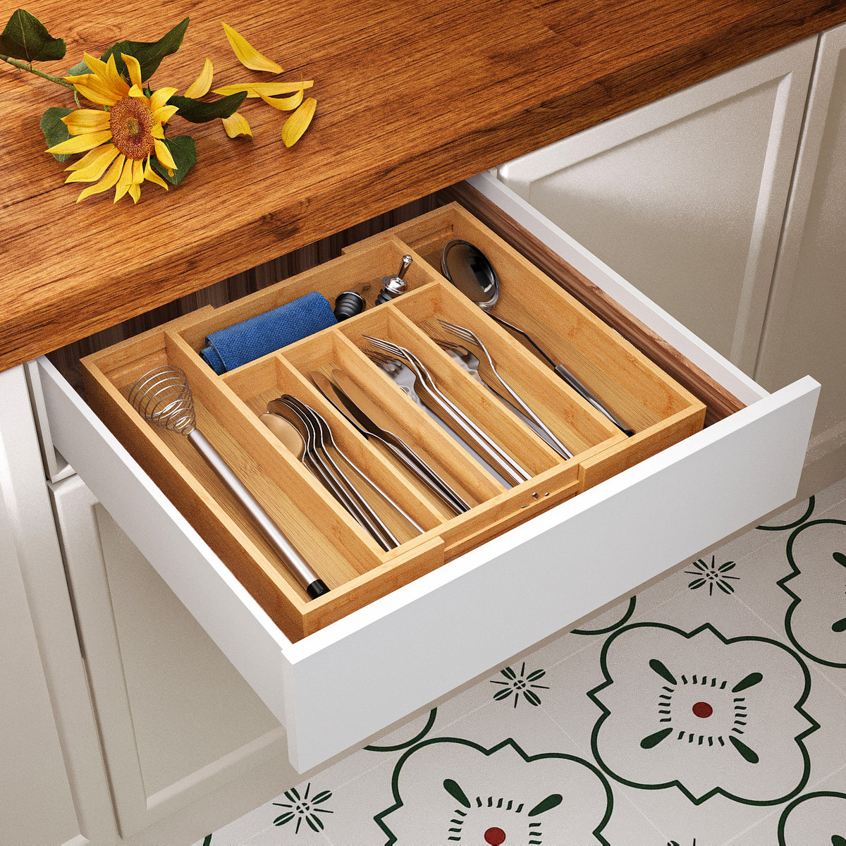 Bamboo drawer organizer with 5+2 compartments viewed from the side with contents
