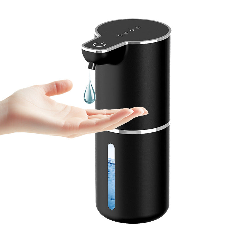 White automatic sensor soap dispenser with hand underneath
