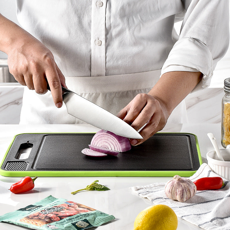 Double-sided defrosting cutting board with sharpener