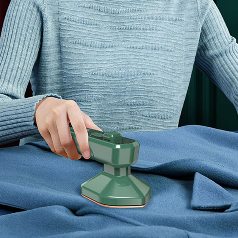 Handheld garment steamer showing its water reservoir