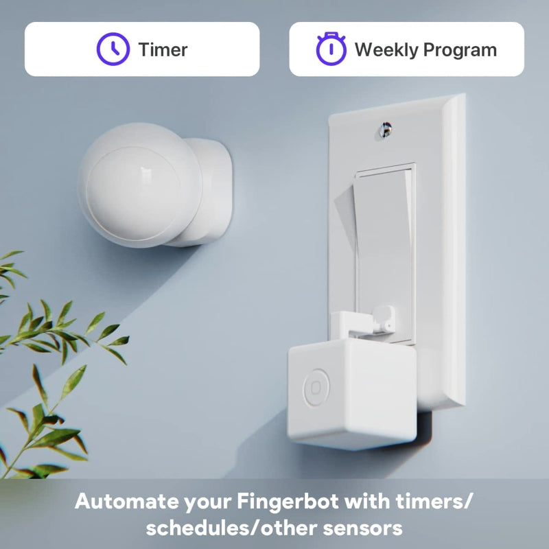 White robot finger mechanism demonstrated on a red button