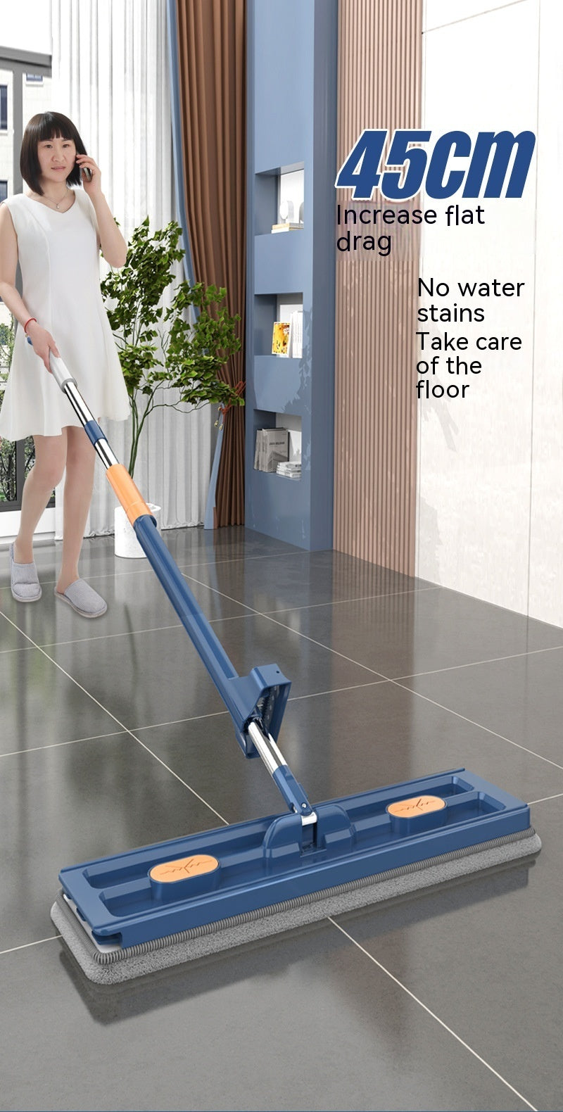 Blue flat mop with long handle held in a sweeping motion