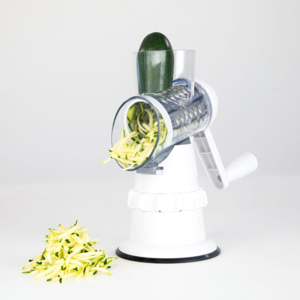Compact manual slicer for kitchen food preparation