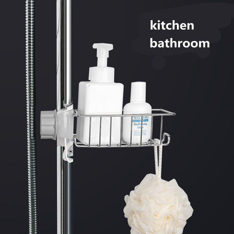 Stainless steel sink sponge holder holding a sponge and brush
